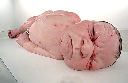 A just born baby in all its stark 'newness' and the streile environment that surrounds it is a confronting image
