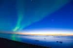 Solar Flares emanating off of the surface of the sun, closer to the earths magnetic poles result in beautiful displays of light we call aurora borealis or northern lights.