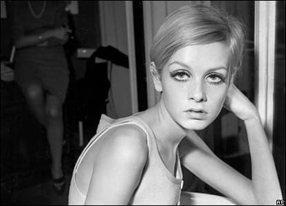 Twiggy wearing her trademark behind the ears boyish bob, cut by Leonard's hair salon in Mayfair in 1966