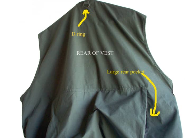 Items that can be folded and flatten such as an emergency blanket and plastic rain poncho should go in the rear pocket of your survival vest