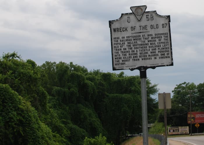 But it's a mighty rough road from Lynchburg to Danville With a line on a three mile grade It was on that grade that he lost his air brakes see what a jump he made He was goin' down the grade makin' 90 miles an hour his whistle broke into a scream He