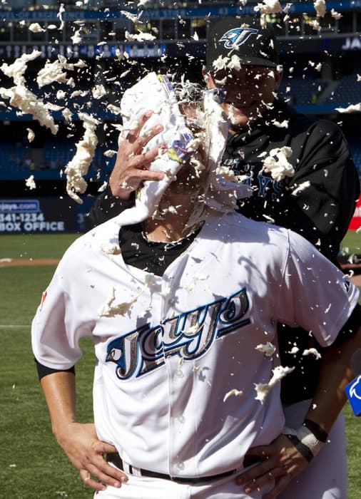 On August 7, 2010, Toronto Blue Jays J.P. Arencibia gets a celebratory shaving cream pie in the face after opening night Blue Jays win. It was Arencibia's first major league appearance.