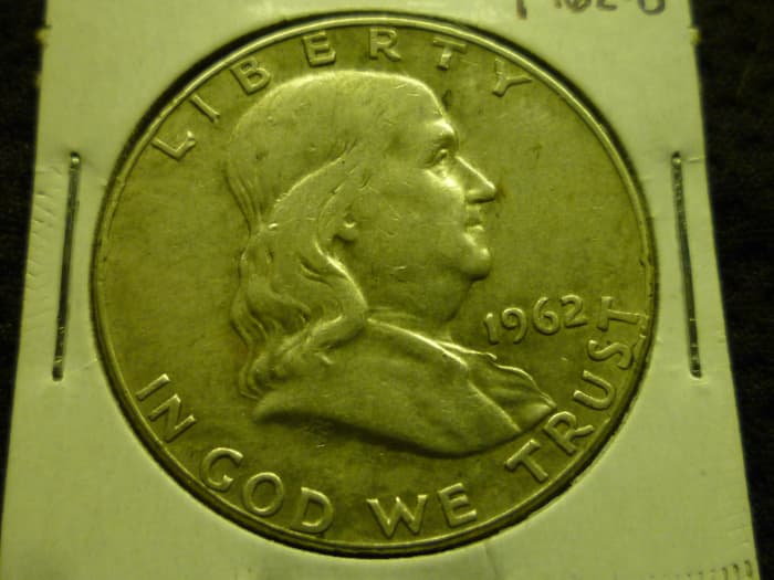 Circulated 1962 Franklin Half Dollar. This coin as with most circulated Franklin Half Dollars is worth the melt value of $14.60