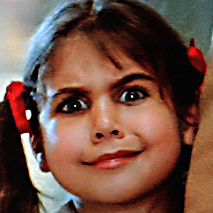 Not really relevant to the film's plot, but just one of the curious onlookers at the train station was this little girl with possibly the most intense stare in movie history (but is it really cute or is it really evil - you decide)