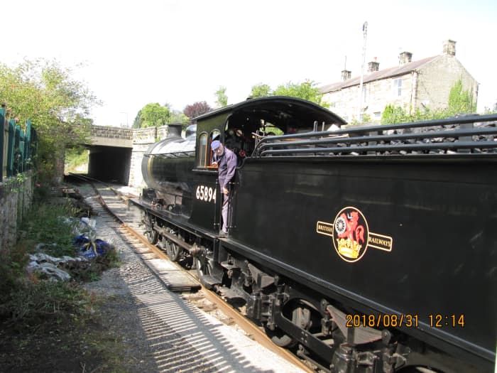 And we're off, west to Redmire with fireman Pete James taking a rest to let cleaner Tom Noble shovel the black stuff
