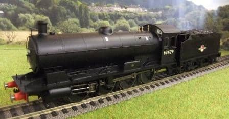 The Hornby Class Q6 0-8-0 with late crest, Catalogue R3426 in a 'natural' model setting - but where's the lineside fencing?