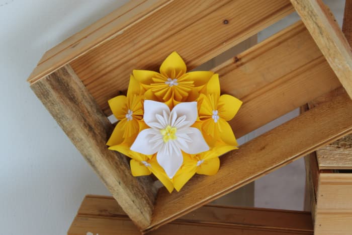 A multi-purpose origami centrepiece that I made for my friend's wedding. Used here as a decorative piece in wooden crates.