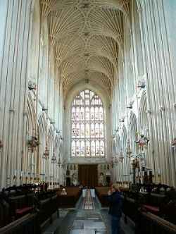 The Interior of Bath Abbey, facing the West Window, this photo gives a good view of the fan vaulting in the ceiling.
