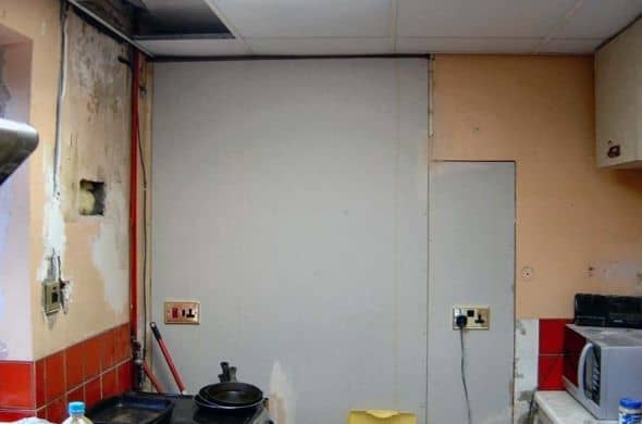 New stud wall in kitchen, blocking off old dead space to maximise on wall space and create an area behind for a cloakroom.