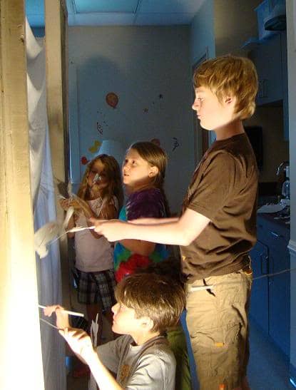 The kids in our homeschool co-op rehearsed their shadow puppet play for several days prior to putting it on during the end-of-the-year program.