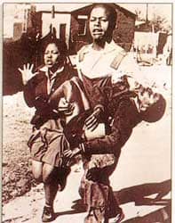 June 1976 Revolution - Mbuyiselo carrying the limp body of Hector Pietersen among the first victims shot by the police at the start of the students march in 1976