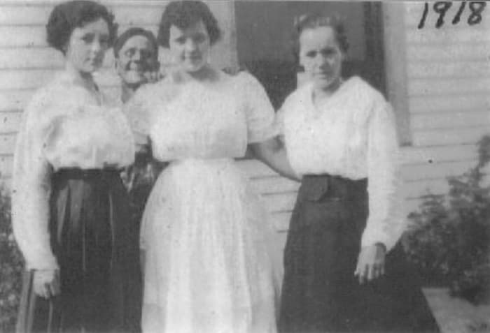 My grandmother (Ruth) in the center. Her friend, Bertha McGhee on the right. Ruth married Bertha's brother.