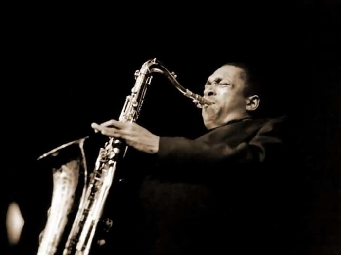 John Coltrane's anguished tone and multi-noted, rhythmically complex solos quickly elevated him to the front ranks of jazz. The incredible technical and harmonic content of his playing at that time led to a style described as "sheets of sound," that,