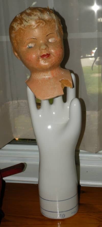 I use my glove molds to display my old doll head collection! Talk about urban decay...