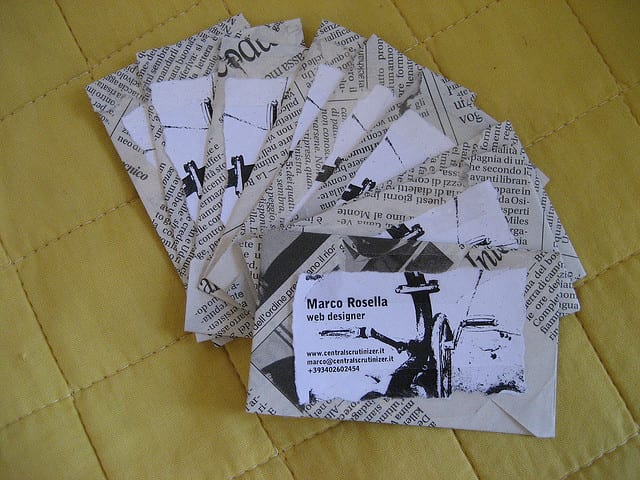 These cards are made from an old italian newspaper, with a printed section then taped onto the centre. Very cool.