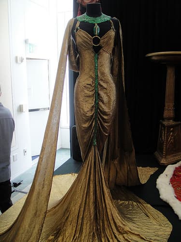 Debbie Reynolds Auction - Claudette Colbert gold-lame and emerald royal boudoir gown from "Cleopatra" (1934) by Kevin Cline, courtesy of PopCultureGeek