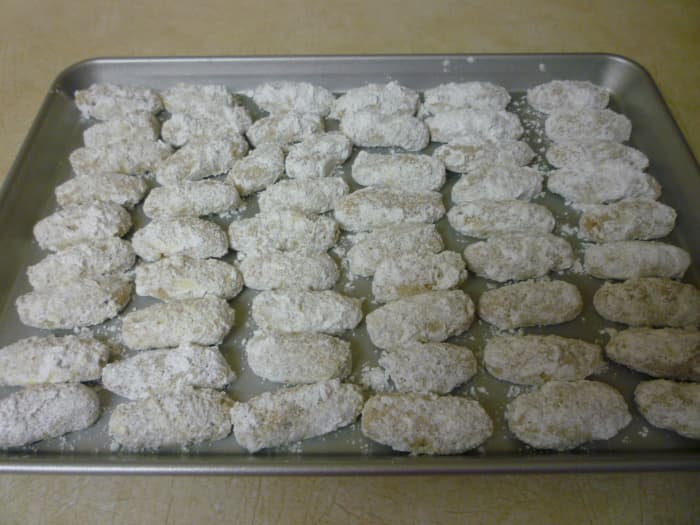 Pecan fingers cooling in another pan and ready to share with cookie lovers of all ages.