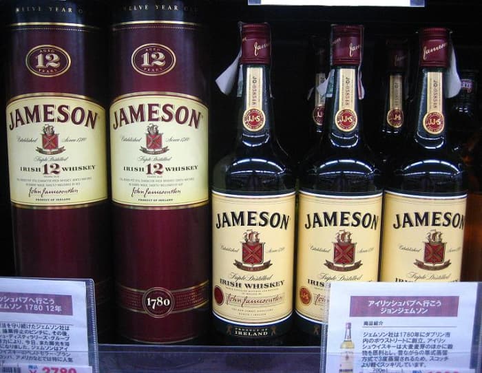 Whiskey, and sometimes the appearance of drinking whiskey, can keep you at a safe distance from others.