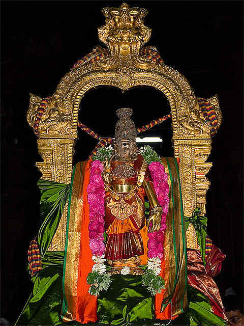 Indian Goddess Meenakshi is adorned with temple jewelry at a temple in Karpagragam, Tamil Nadu in South India.