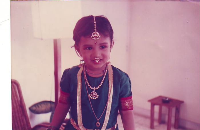 In this photo, I wore a nose ring and a trademark hair center jewelry accessory