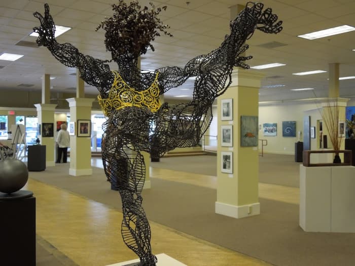 "Yellow Girl" by Eveny Zirul, welded steel and recycled clothes