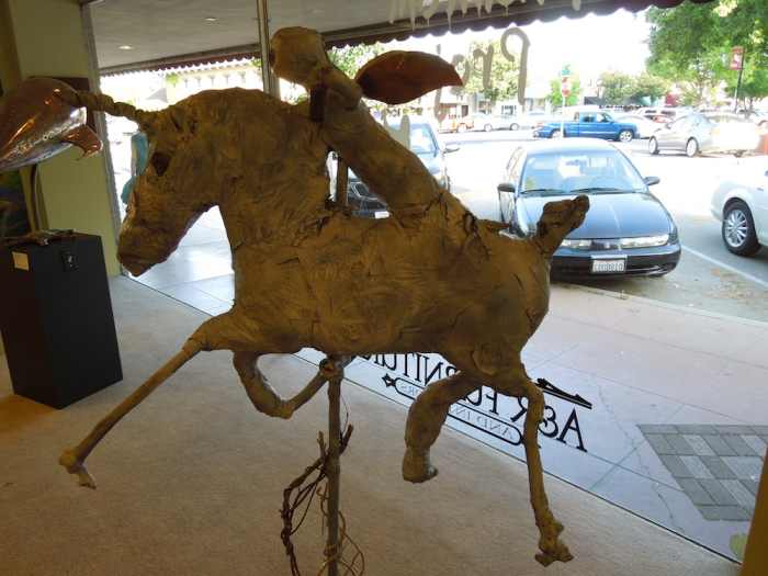"Good Ride" by Jeanette Wolff, a mixed media with plastic, paper, and metal.