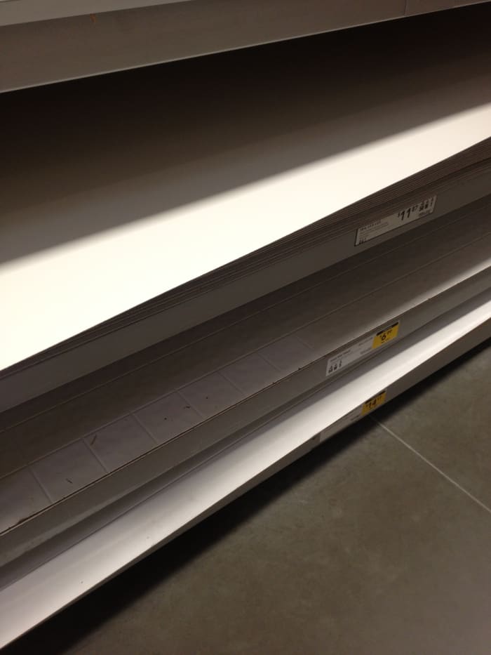 It was on top of another sheet & on the middle of Aisle 50 (in case you are too afraid to ask for Help)