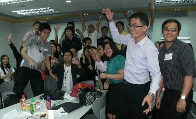 Dennis Magallanes, hamming it up with other SGV auditors at the corporate office in Makati