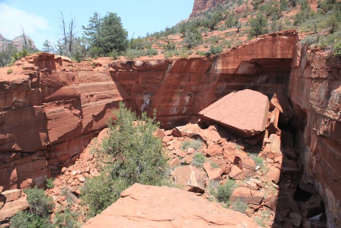 The sinkhole. The large piece of rock in the far right corner is about 15 feet by 25-30 feet, a footprint about the size of an average ranch-style home.