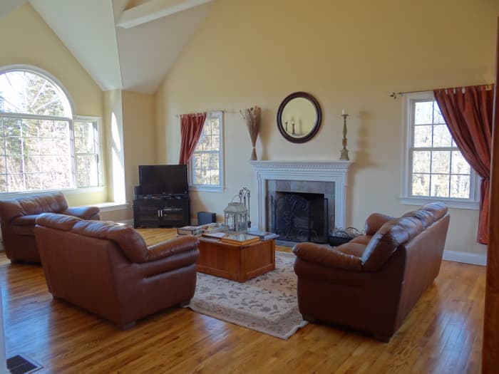 The vaulted ceilings of my family room, shown here, did not compliment the shabby chic decor.