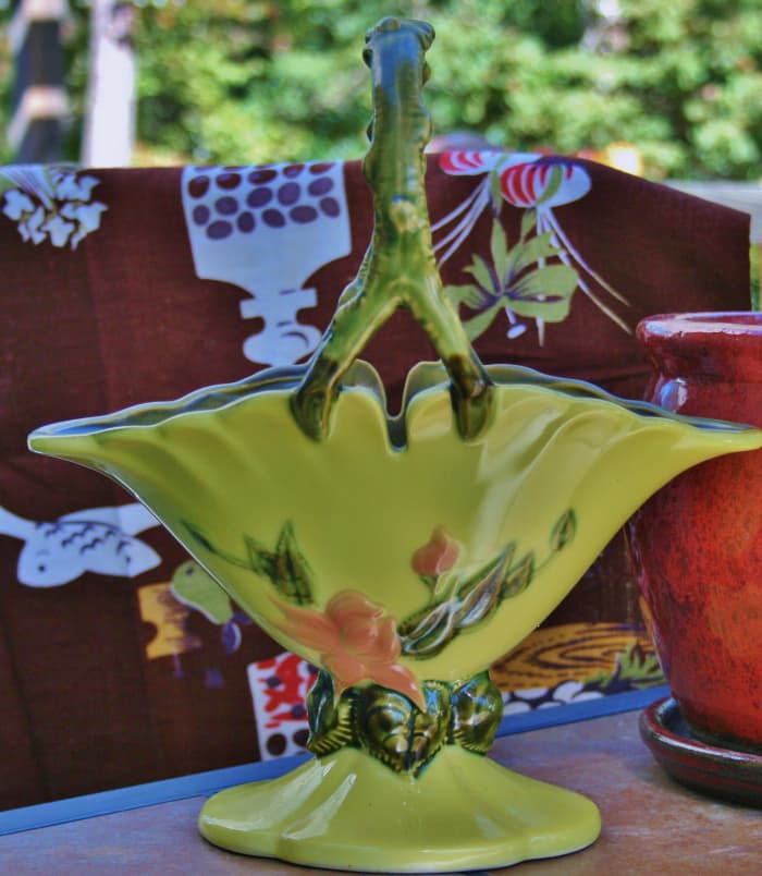 Hull Woodland basket vase/jardinière with faux branch handle and flower design on both sides.