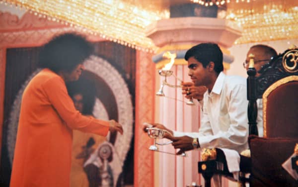 Swami used to 'light' the camphor for quite some time after which He expected the devotee to do the 'lighting' on his own!