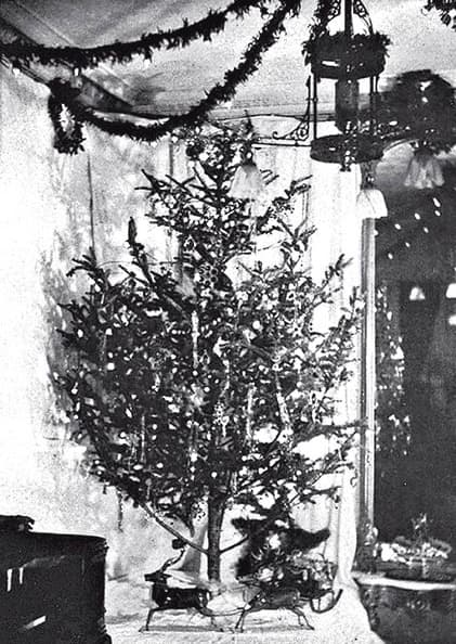 Photo of the first Christmas tree with electric lights in the home of Edward H. Johnson, Thomas Edison's associate, in 1882.