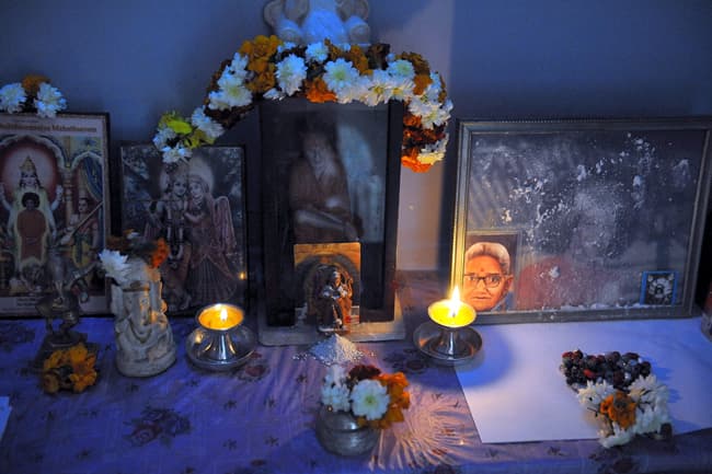 The heap of vibhuti in front of Lord Hanuman in the altar as we saw it on the morning of the 2nd January.