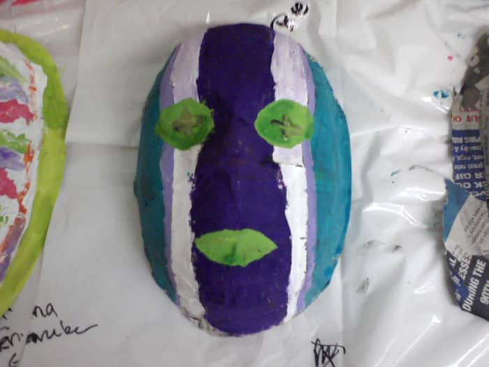 The masks were built on a facial mold, allowed to dry and then painted as the students liked