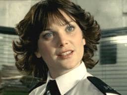 Actress Liz White, wearing a recreated 70s upward flick style for the British TV show, "Life on Mars".