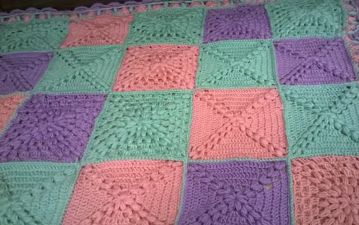 Here is an example of my own Hugs and Kisses Blanket Design. With X and O pattern all done using double crochet variety design