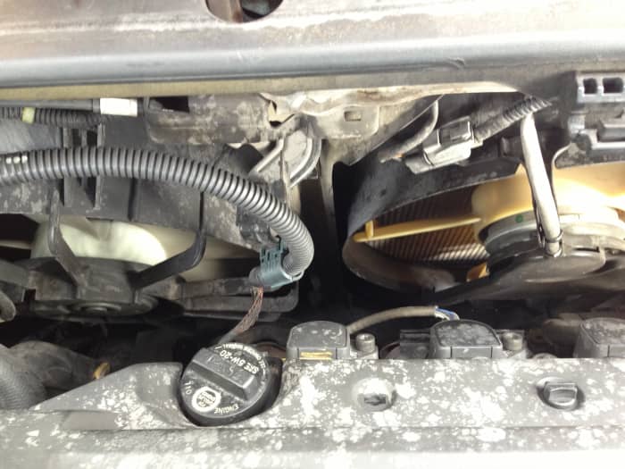 Radiator/"auxiliary" fans cool the engine when the car is stopped/moving slowly (pulling in air that moving typically supplies).