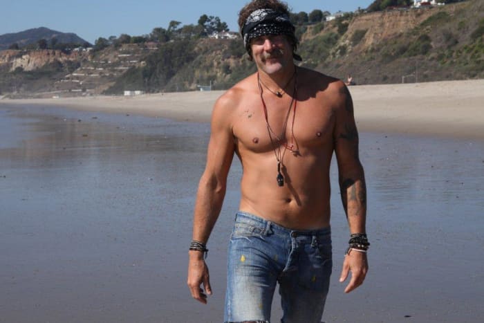 Donavon Frankenreiter is a professional surfer, musician, and a personal friend of Chan Luu. Here is in on a beach wearing Chan Luu bracelets