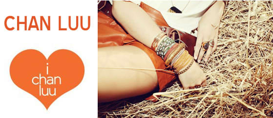 fashionable leather wrap bracelets layered on one wrist set against a matching leather skirt