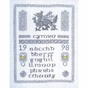 Ornate sampler depicting the Welsh dragon and masses of Celtic knots. With Welsh alphabet.