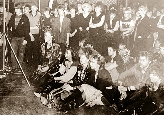 A photo of fans watching a band in Blackpool in the early '80s. My friends Nila, Boz and Jenny are sitting on the front row. My other friend, Sue, is standing 4th from the right at the back.