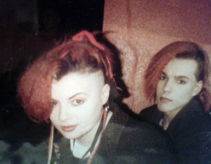 My friend Kevin had bright red, jaw-length extensions. Later, he had black and blonde ones put in. Michelle's hair on this photo was her own.
