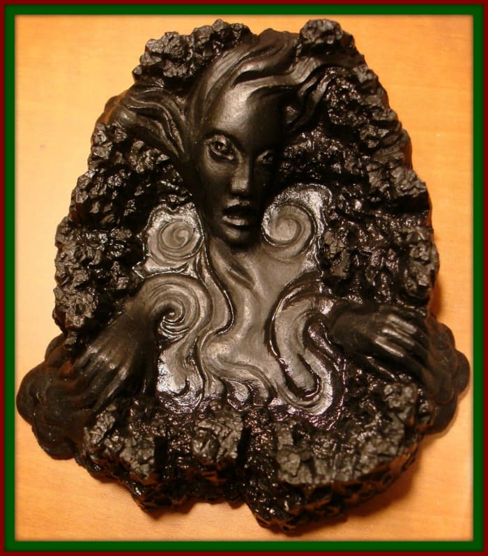 Pele is the Goddess of the volcanoes. This awesome piece measures approximately 5 inches long, 4 1/4 inches wide and is 1 1/2 inches in height. A beautiful work of art.