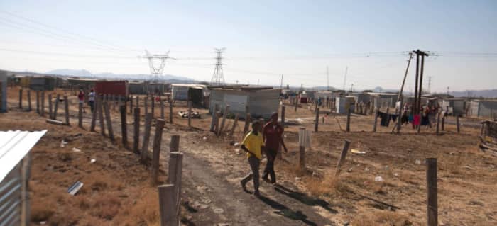 Ramshackle Hovel Where Miniers Live-Cyril Ramaphosa is one of he Shareholders on some mine some of these miners on strike in.
