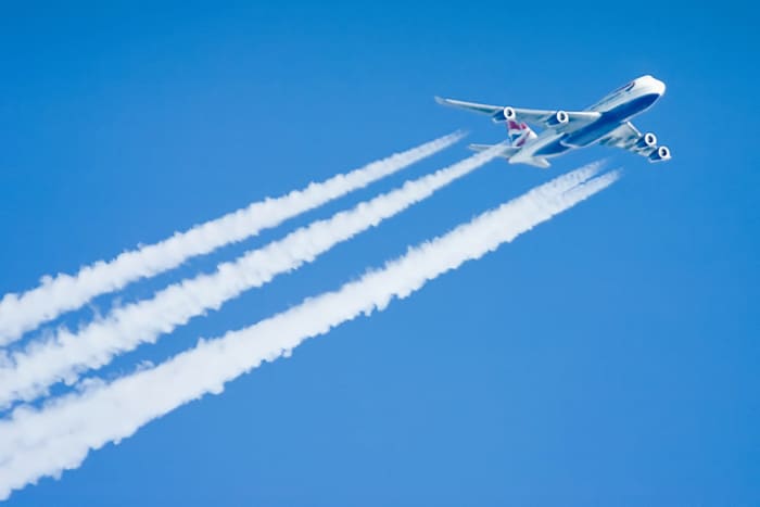 A Four-engined Boeing 747 with contrails. Contrails are produced by condensation of exhaust gases in the cold thin air. But this contrail contain also poisonous gases like NOx, HOx, COx, SOx and organics, formed during the combustion of kerosene.