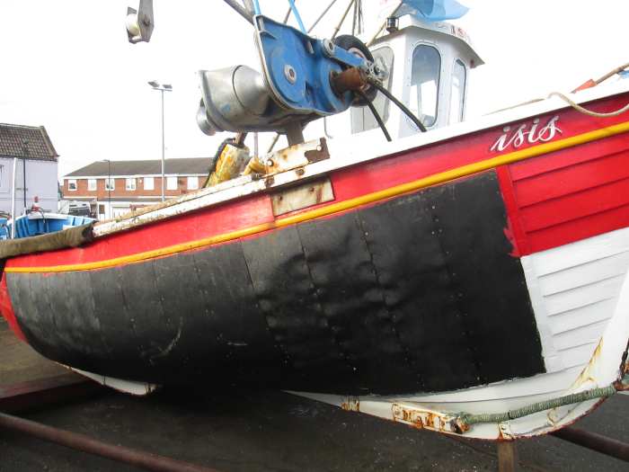 A much patched up Coble with cab and net winch on Fisherman's Square, Redcar (off Lord Street, behind High Street East)