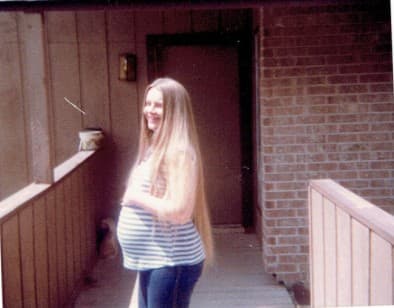 There I am pregnant with my first born child, my beautiful daughter. Just look at that crazy long hair! I was so huge that when people saw me coming they would move out of my way.