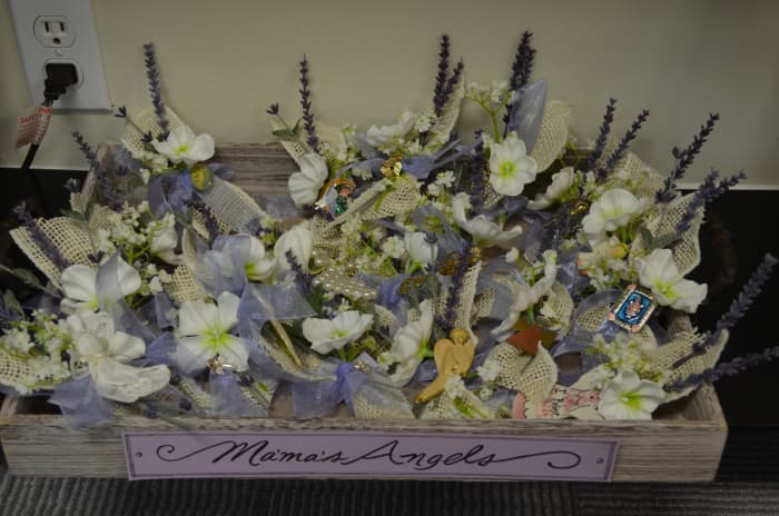 My mother loved angels so we took her pins and made corsages out of them as a keepsake for each family member.