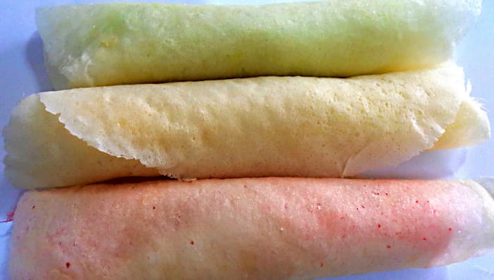 The finished 'roti saimai' - both the burrito-like roti and the candy floss filling - come in a range of colourings and flavourings
